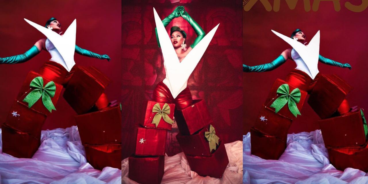 Celebrity Stylist Toyin Lawani poses as a Christmas gift box for her Christmas photoshoot