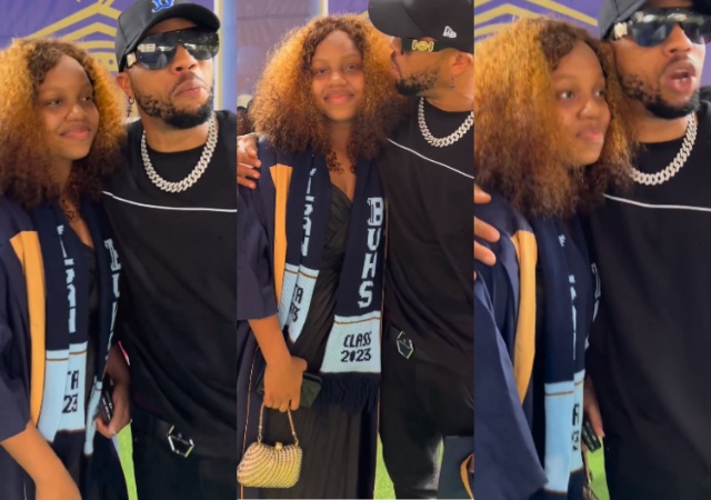 Actor Charles Okocha enthusiastically hails his daughter during her matriculation ceremony at Bobcock University